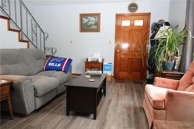 42 Mechanic St, Collins, NY 14070 - living room featuring light wood-style flooring and stairway