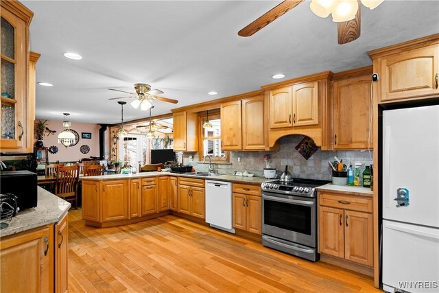 11400 Savage Rd, Sardinia, NY 14030 - kitchen with white appliances, a ceiling fan, a sink, recessed lighting, and a peninsula