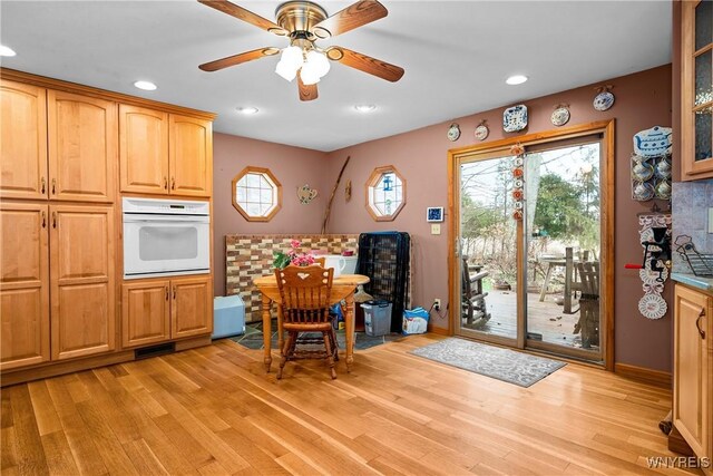 11400 Savage Rd, Sardinia, NY 14030 - dining room with light wood-type flooring, a ceiling fan, and recessed lighting