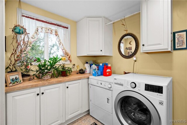 11400 Savage Rd, Sardinia, NY 14030 - laundry area featuring independent washer and dryer and cabinet space