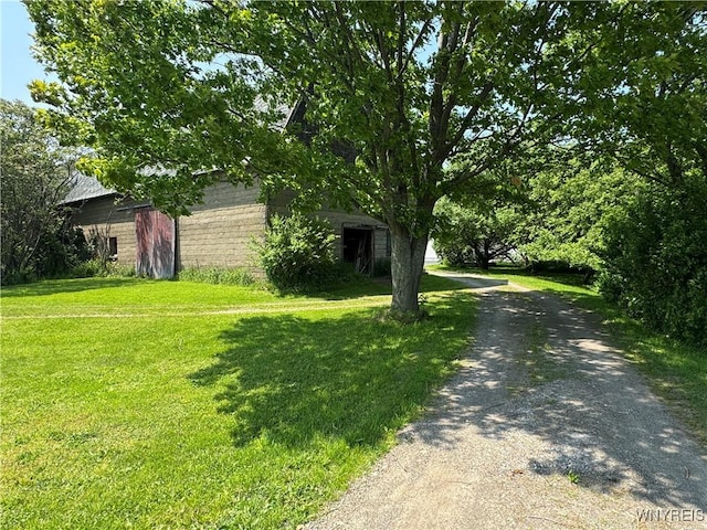 11400 Savage Rd, Sardinia, NY 14030 - view of front of house with a front lawn and asphalt driveway