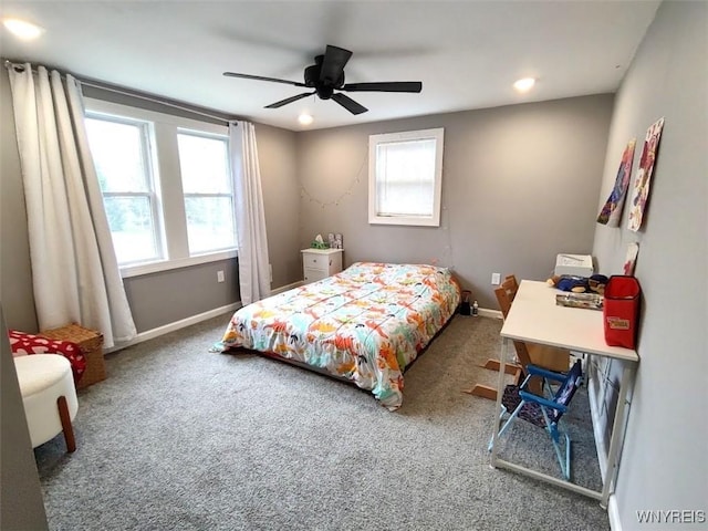 carpeted bedroom with recessed lighting, multiple windows, baseboards, and ceiling fan