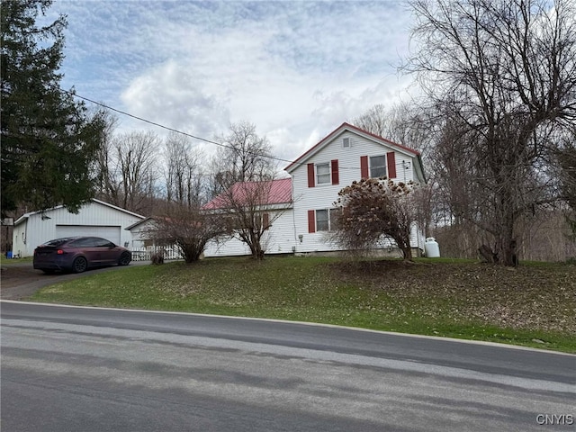 525 Bell Hill Rd, German Flatts, NY 13357 - view of front of property with a detached garage and a front yard