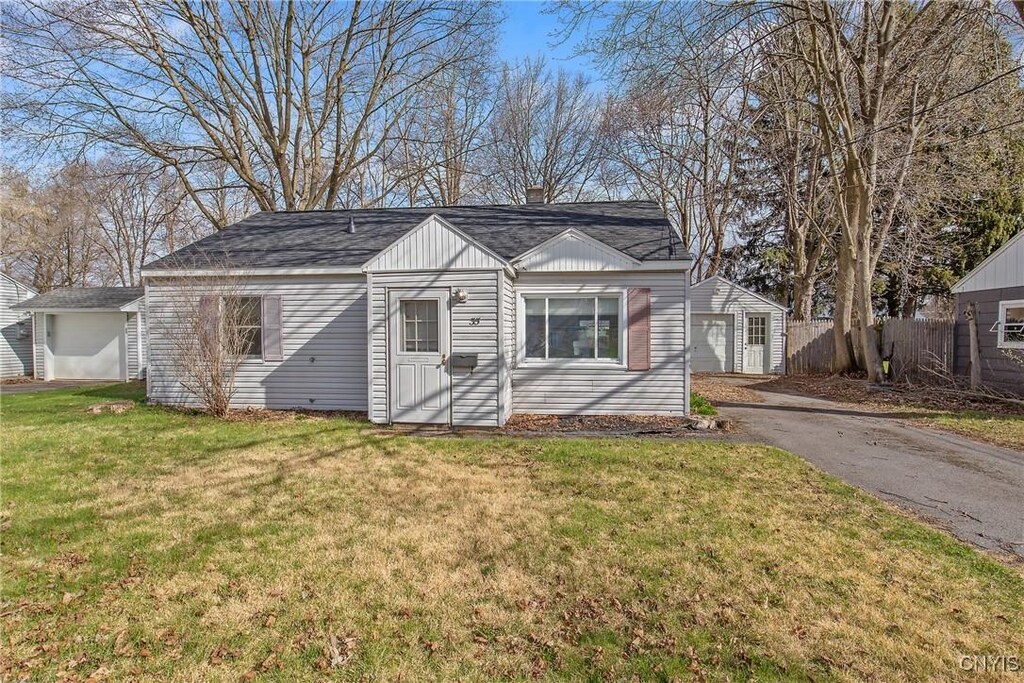 35 Waterbury Dr, Clay, NY 13212 - view of outdoor structure with fence and aphalt driveway