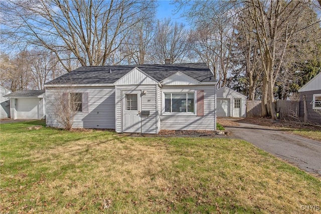 35 Waterbury Dr, Clay, NY 13212 - view of outdoor structure with fence and aphalt driveway