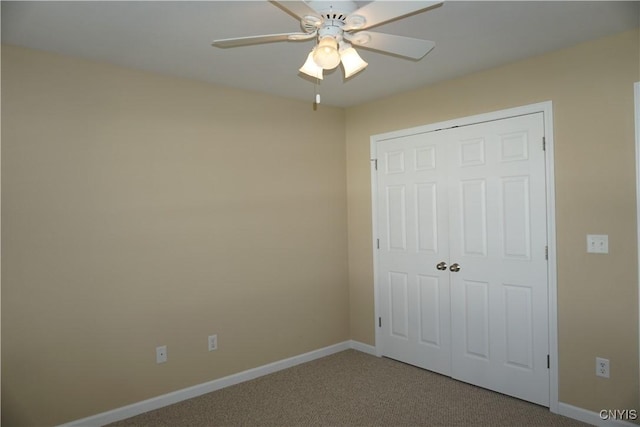 4828 Lighthouse Village Cir, Clay, NY 13088 - unfurnished bedroom with a closet, carpet, baseboards, and a ceiling fan