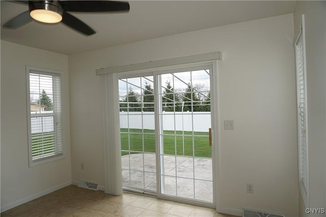 4828 Lighthouse Village Cir, Clay, NY 13088 - doorway to outside with a wealth of natural light, visible vents, and baseboards