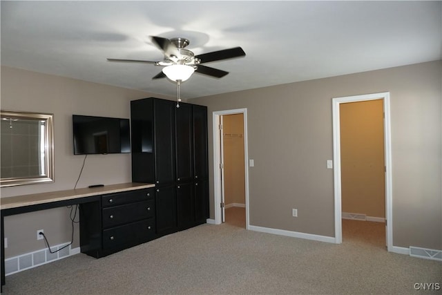 4828 Lighthouse Village Cir, Clay, NY 13088 - unfurnished bedroom with light colored carpet, baseboards, a spacious closet, and visible vents