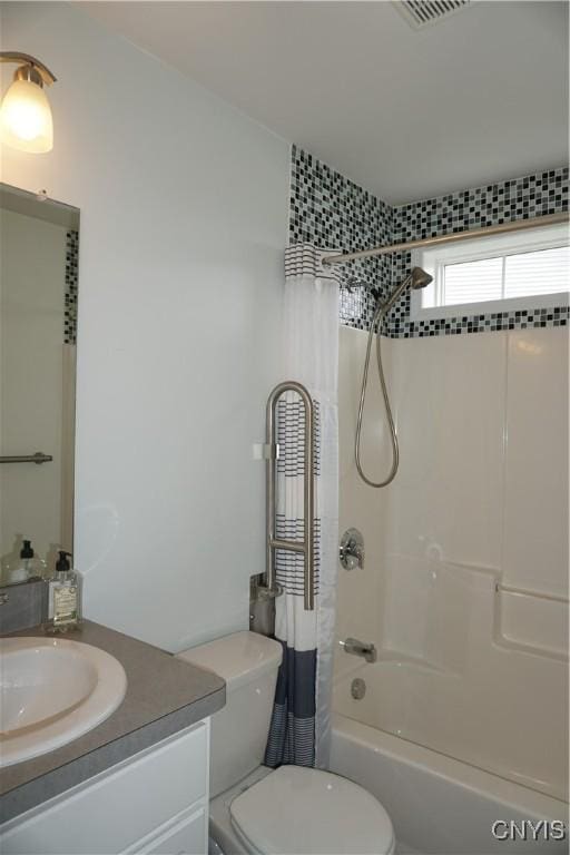 4828 Lighthouse Village Cir, Clay, NY 13088 - full bathroom featuring toilet, vanity, shower / bath combination with curtain, and visible vents