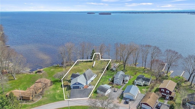 aerial view with a residential view and a water view
