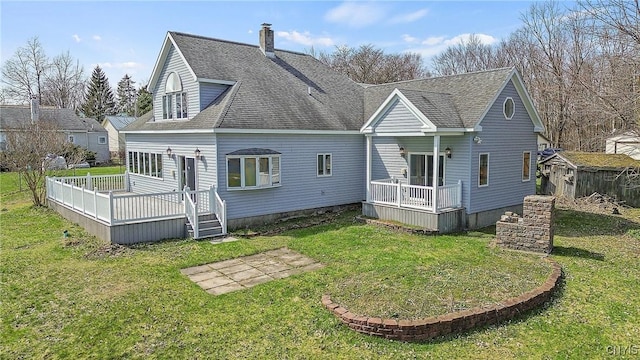 28 Wedgeworth Dr, West Monroe, NY 13167 - back of property featuring a lawn, a deck, a chimney, and a shingled roof
