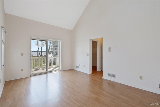 28 Wedgeworth Dr, West Monroe, NY 13167 - unfurnished room with light wood-style flooring, baseboards, and high vaulted ceiling