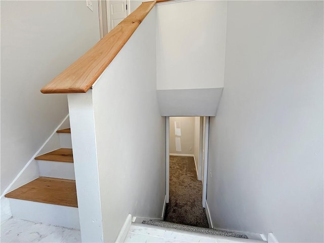 stairway with baseboards