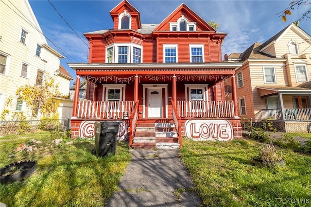 2107 S State St, Syracuse, NY 13205 - view of front of property with covered porch and fence