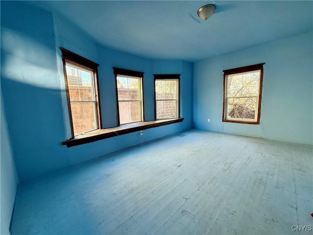 2107 S State St, Syracuse, NY 13205 - unfurnished room with wood finished floors
