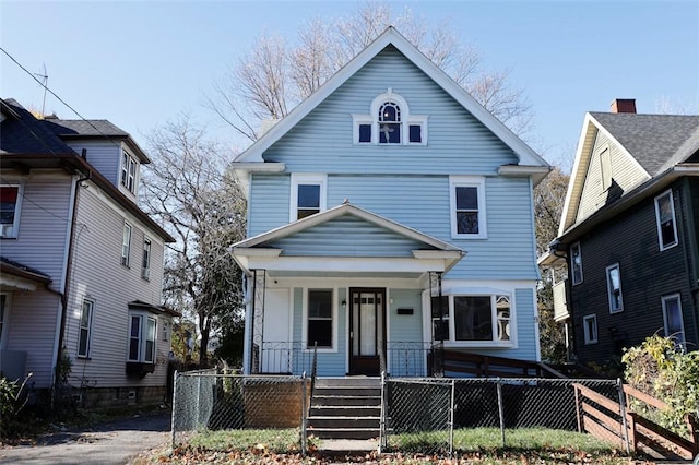9 Renwood St, Rochester, NY 14621 - traditional style home with a porch and a fenced front yard