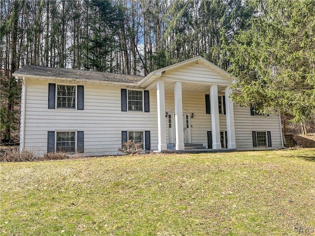 6449 W Scott Rd, Scott, NY 13077 - raised ranch with a porch, a front lawn, and view of scattered trees