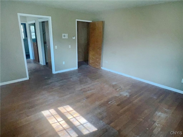 6449 W Scott Rd, Scott, NY 13077 - unfurnished room featuring baseboards and wood finished floors