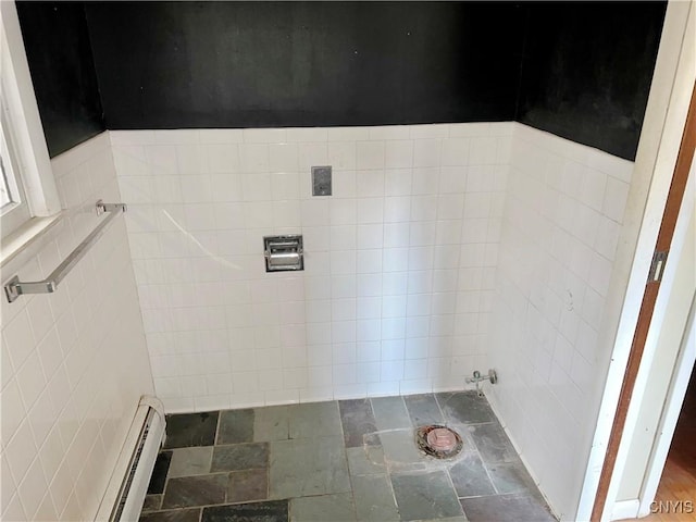 6449 W Scott Rd, Scott, NY 13077 - bathroom featuring baseboard heating and tile walls