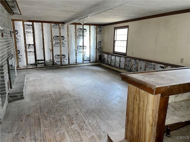 6449 W Scott Rd, Scott, NY 13077 - basement featuring wood finished floors and a brick fireplace