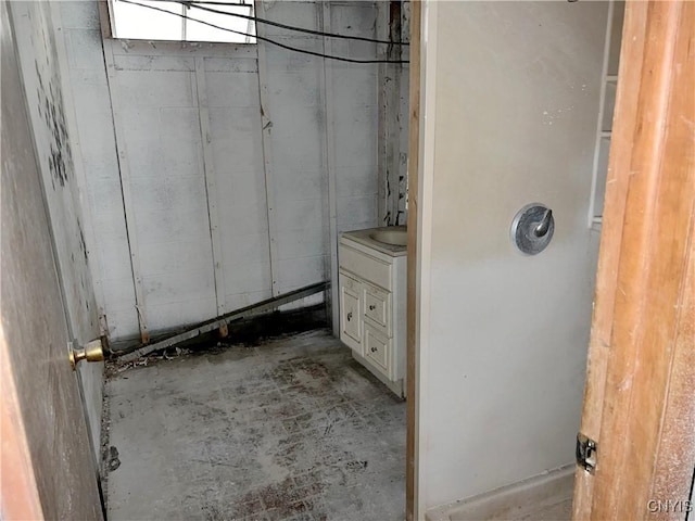 6449 W Scott Rd, Scott, NY 13077 - bathroom featuring concrete flooring and vanity