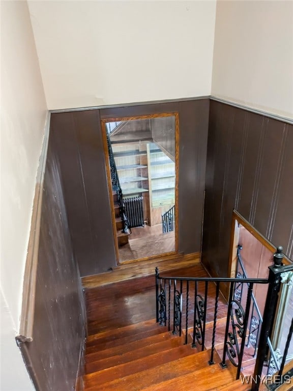 2300 Main St, Buffalo, NY 14214 - staircase featuring radiator and wood finished floors