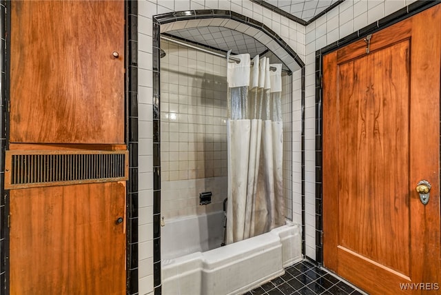 2300 Main St, Buffalo, NY 14214 - bathroom featuring tile patterned floors and shower / bath combo