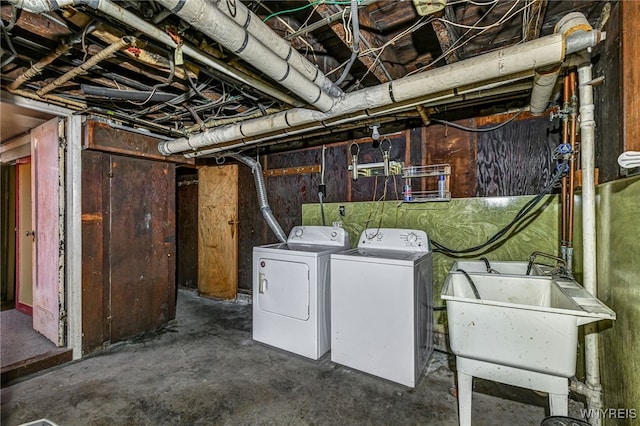 2300 Main St, Buffalo, NY 14214 - unfinished below grade area featuring washer and clothes dryer and a sink