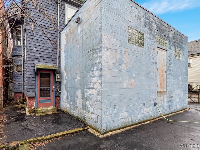 2300 Main St, Buffalo, NY 14214 - view of side of home featuring concrete block siding