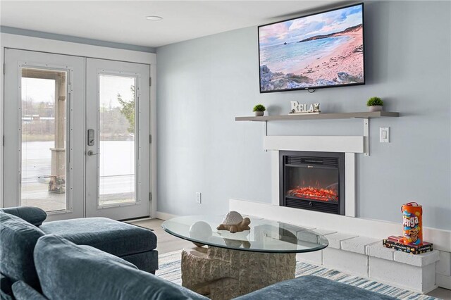 6186 Reservoir Rd, Lebanon, NY 13346 - living area with a glass covered fireplace and french doors