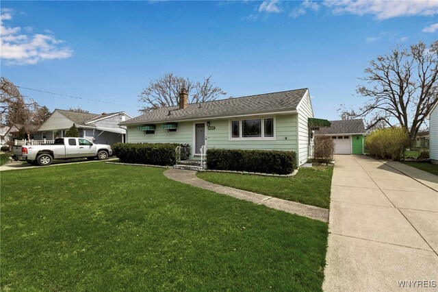 view of front of property with a shingled roof, a garage, a chimney, concrete driveway, and a front lawn