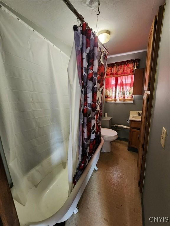 903 Milton Ave, Syracuse, NY 13204 - bathroom with toilet, a shower with shower curtain, and vanity