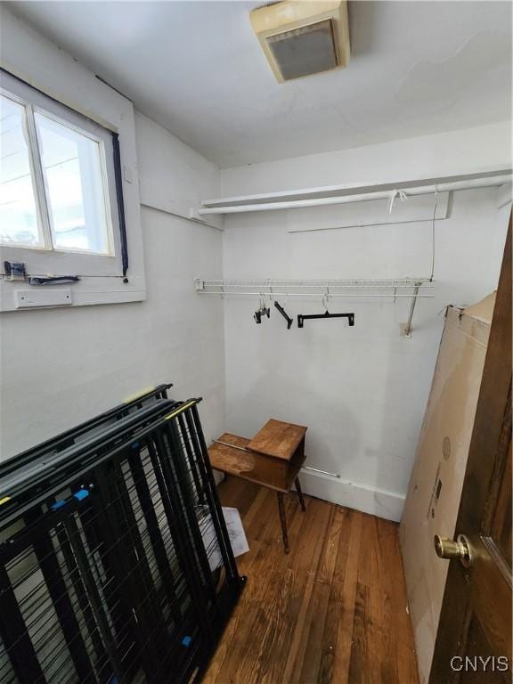 903 Milton Ave, Syracuse, NY 13204 - walk in closet with wood-type flooring