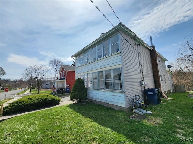 903 Milton Ave, Syracuse, NY 13204 - rear view of property featuring a yard