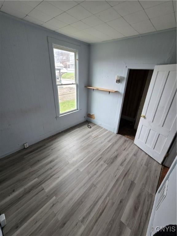 empty room featuring wood finished floors