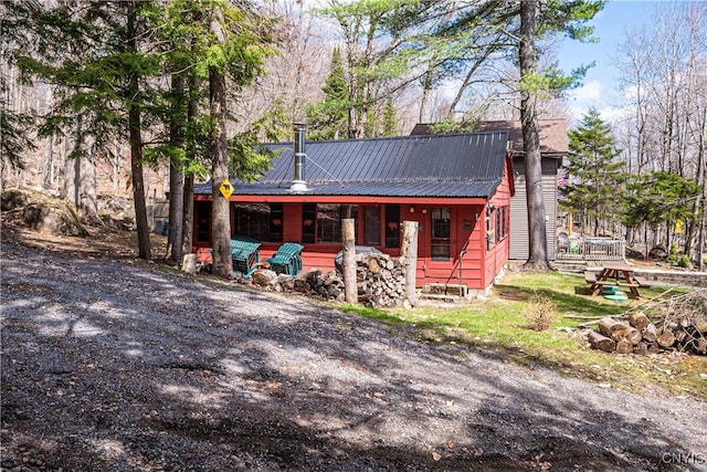 rustic home with metal roof