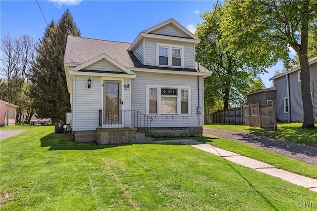 view of front of property with roof with shingles