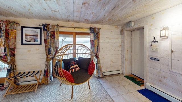 6761 State Highway 80, Otsego, NY 13326 - foyer featuring a baseboard heating unit, wooden ceiling, light tile patterned floors, and wood walls