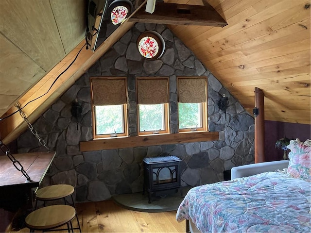 6761 State Highway 80, Otsego, NY 13326 - bedroom with a wood stove, hardwood / wood-style flooring, and wood ceiling