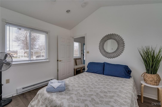 27180 Montonna Shores Rd N, Lyme, NY 13693 - bedroom featuring vaulted ceiling, a baseboard radiator, and dark wood-style flooring