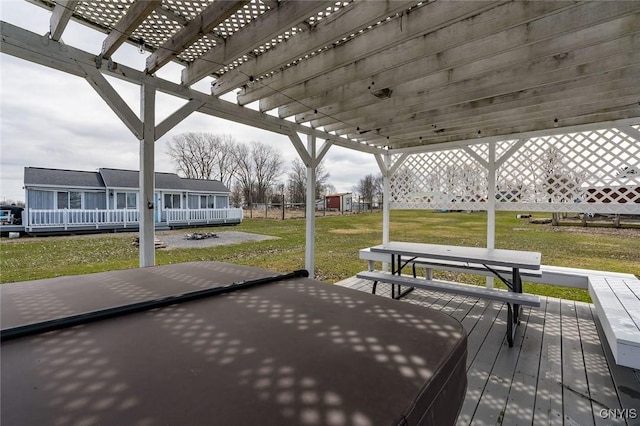 27180 Montonna Shores Rd N, Lyme, NY 13693 - wooden deck featuring a pergola and a lawn