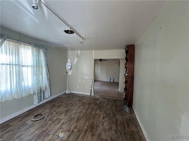 254-256 Bird Ave, Sidney, NY 13838 - empty room featuring wood finished floors, baseboards, and rail lighting