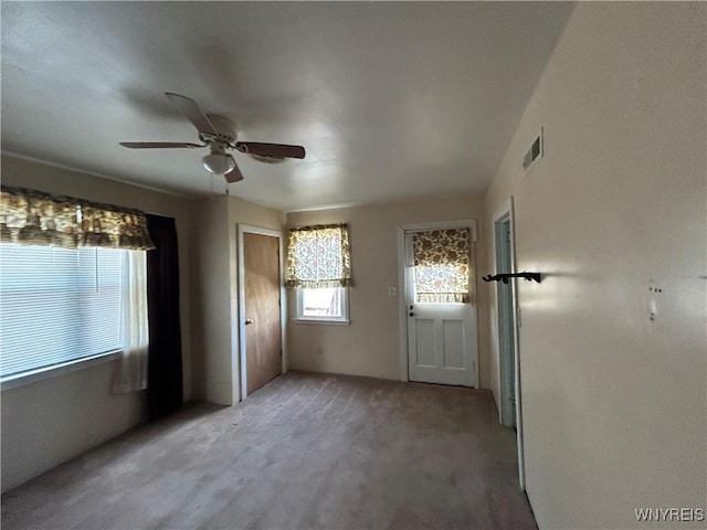 254-256 Bird Ave, Sidney, NY 13838 - empty room with carpet floors and a ceiling fan