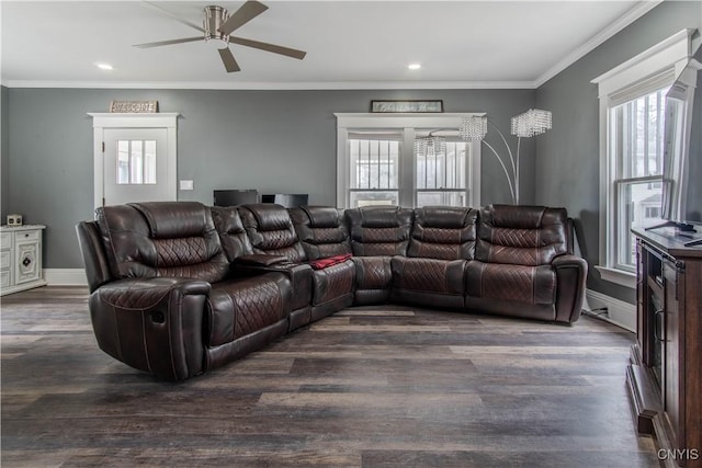 22 Bridge St, Champion, NY 13619 - living area featuring ornamental molding, dark wood finished floors, ceiling fan, and a healthy amount of sunlight