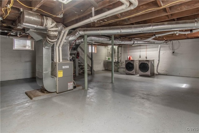22 Bridge St, Champion, NY 13619 - basement with washing machine and dryer and heating unit