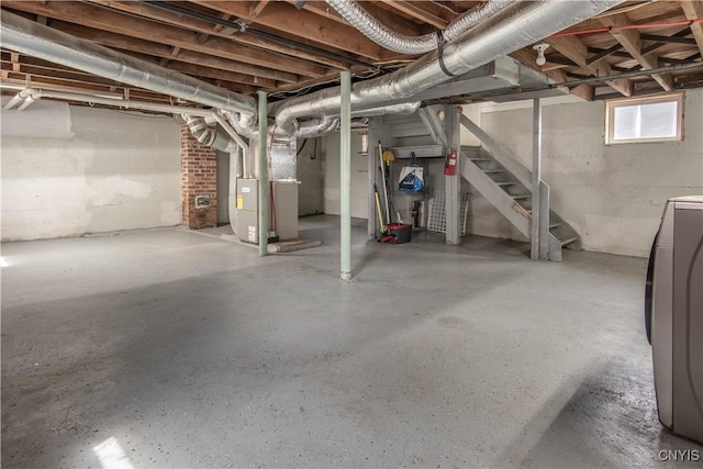 22 Bridge St, Champion, NY 13619 - basement featuring stairs, heating unit, and washer / clothes dryer