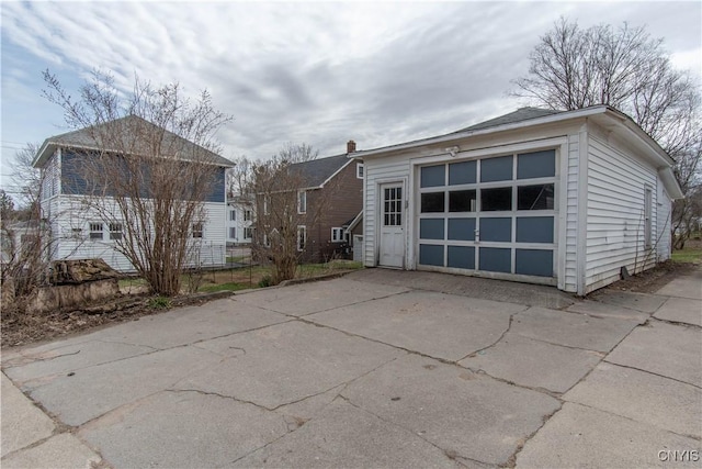 22 Bridge St, Champion, NY 13619 - exterior space featuring driveway, an outbuilding, and a garage