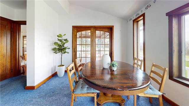 4501 State Route 414, Hector, NY 14818 - carpeted dining area with vaulted ceiling and baseboards
