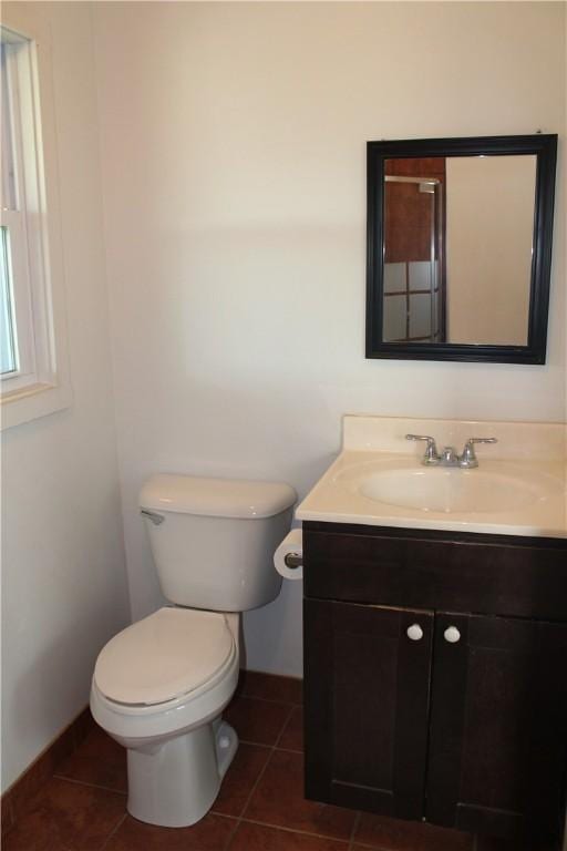 4501 State Route 414, Hector, NY 14818 - bathroom featuring tile patterned floors, toilet, vanity, and baseboards