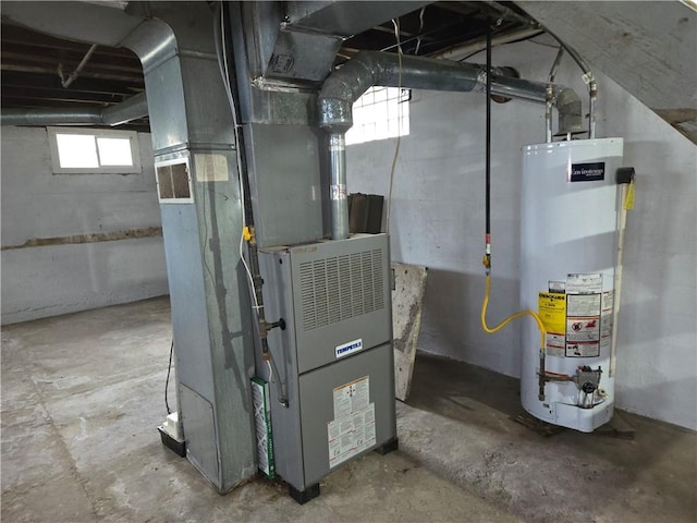 utility room with water heater and heating unit